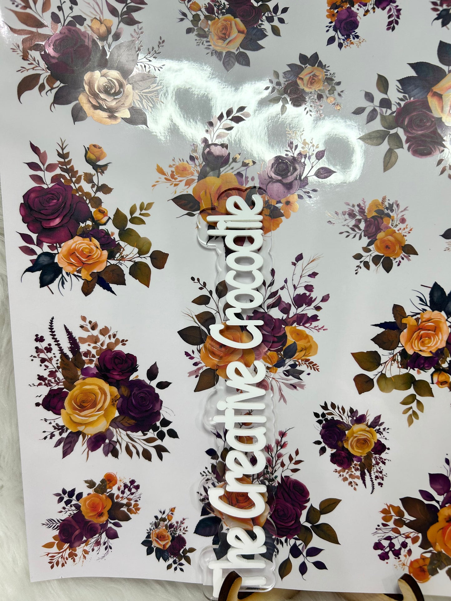 Purple and gold roses