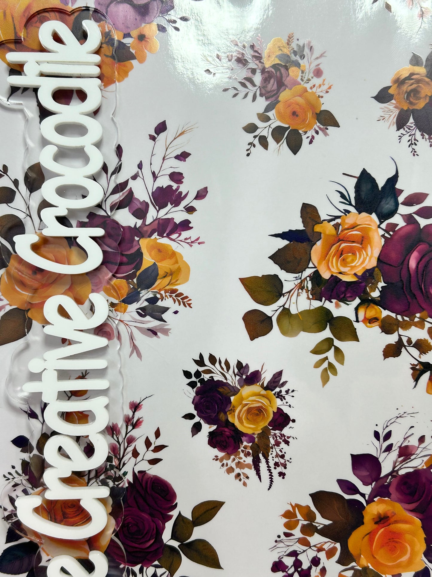 Purple and gold roses
