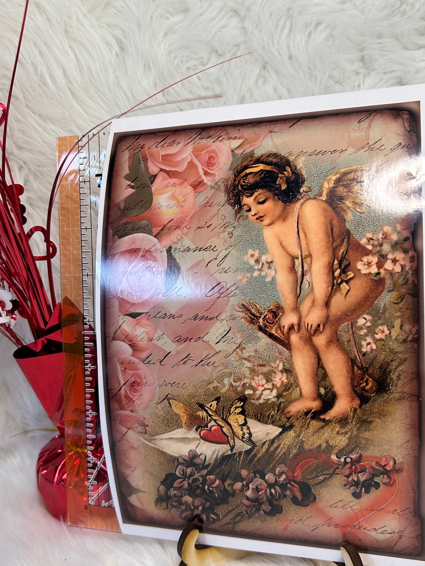 Vintage Cupid with butterflies